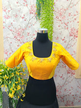 Yellow blouse with embroidery